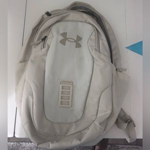 Under Armour cream colored back pack